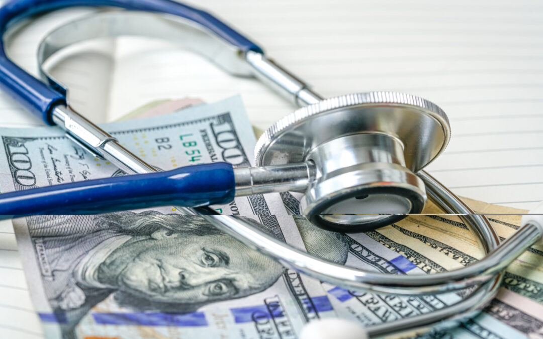 Money with stethoscope